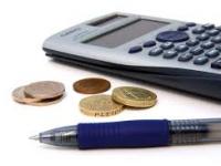 A pen, loose change and a calculator 